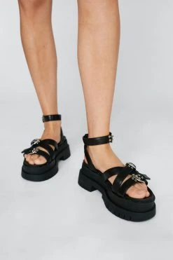 Faux Leather Caged Buckle Cleated Sandals