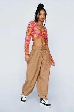 Extreme Parachute Multi Wear Cargo Pants 24 Extreme Parachute Multi Wear Cargo Pants -Nasty Gal shop womens sand extreme parachute multi wear cargo pants 3