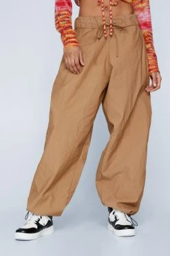 Extreme Parachute Multi Wear Cargo Pants 25 Extreme Parachute Multi Wear Cargo Pants -Nasty Gal shop womens sand extreme parachute multi wear cargo pants 4